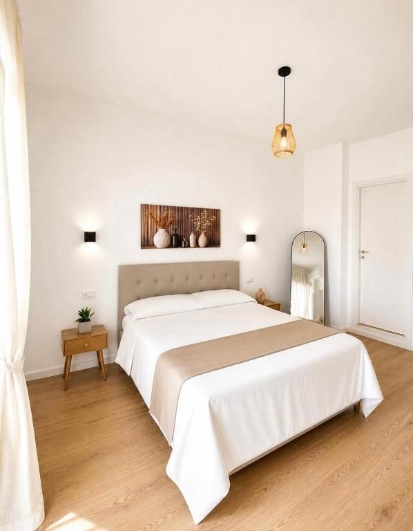 La camera con il letto matrimoniale